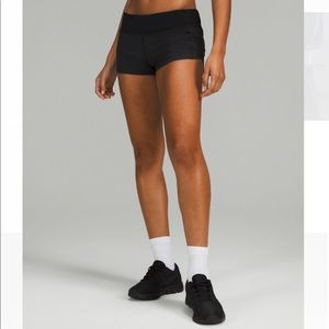 Lululemon speed-up low-rise shorts in black, size 4, 4-inch inseam. Like-new.